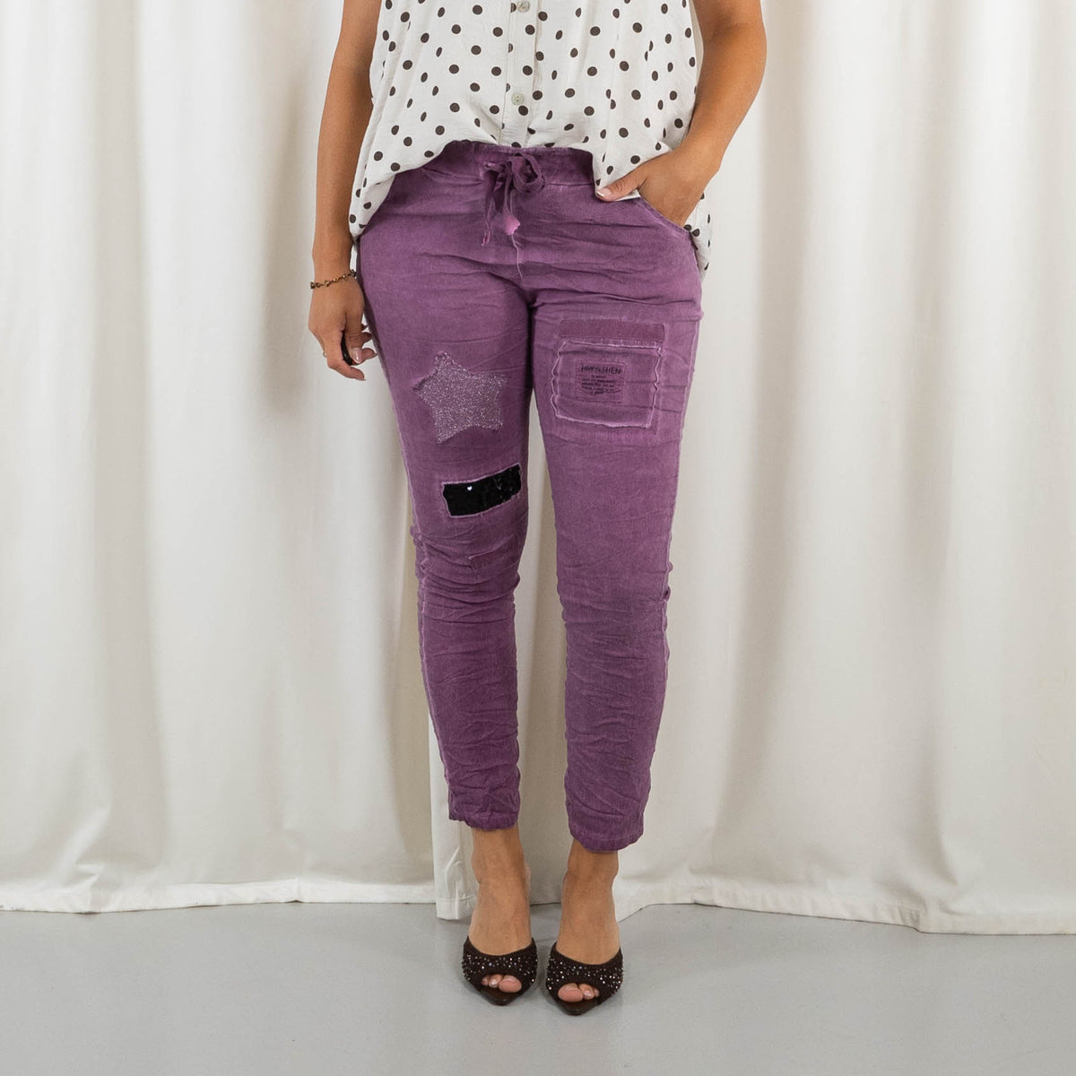 Saturn bukser, Purple